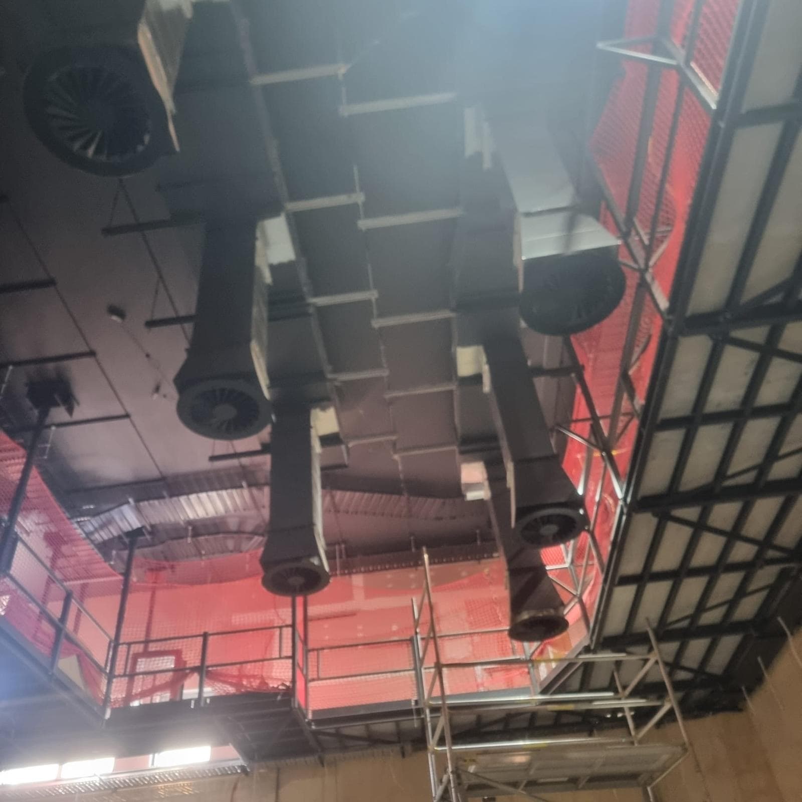 Blacked out air conditioning ducts and diffusers in a theatre ceiling, Orange NSW