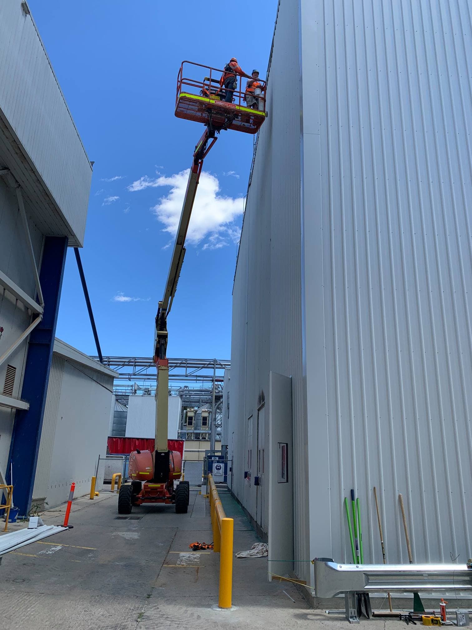 Commercial painting from boom lift