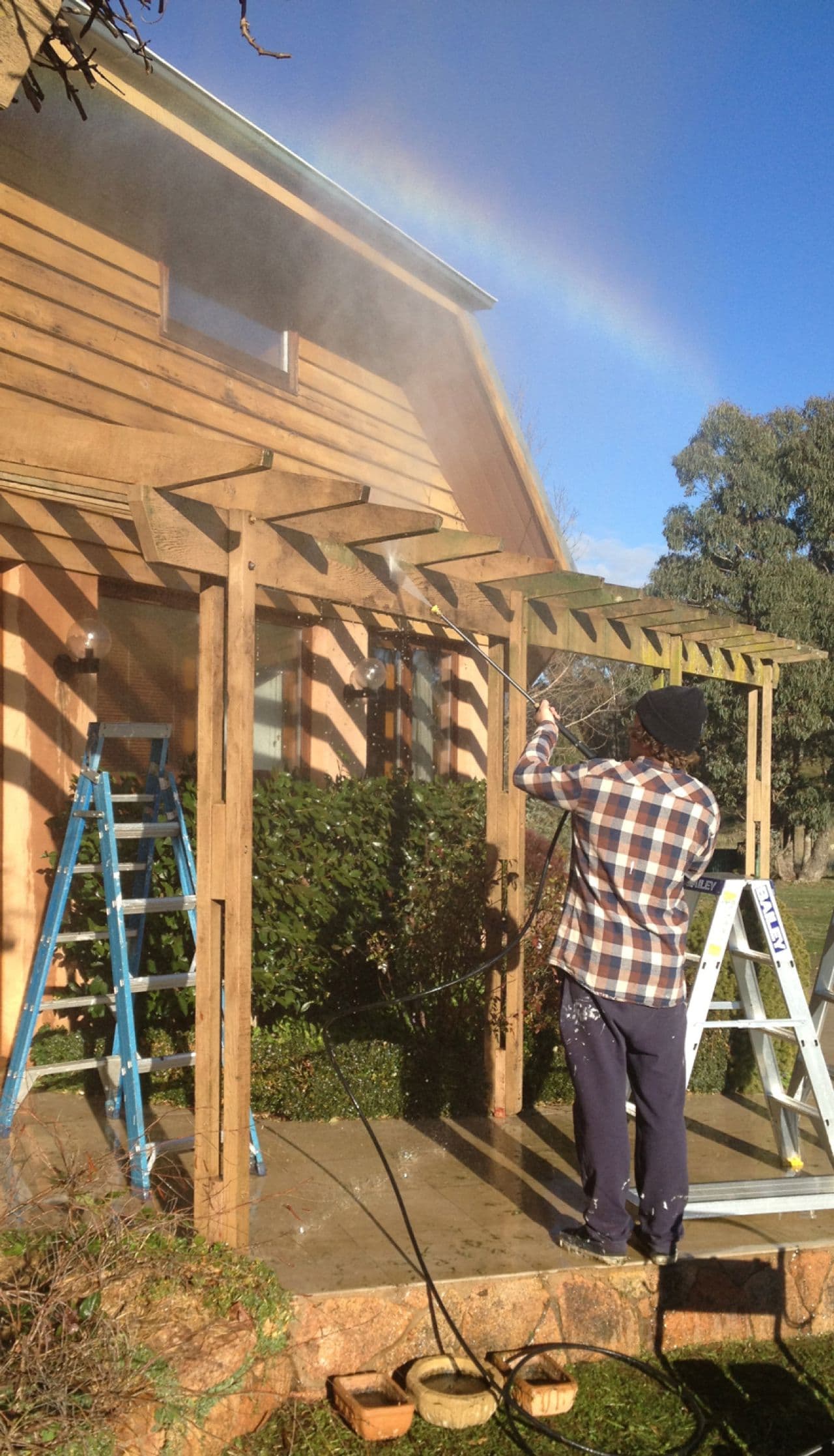 Pressure washing timber porch
