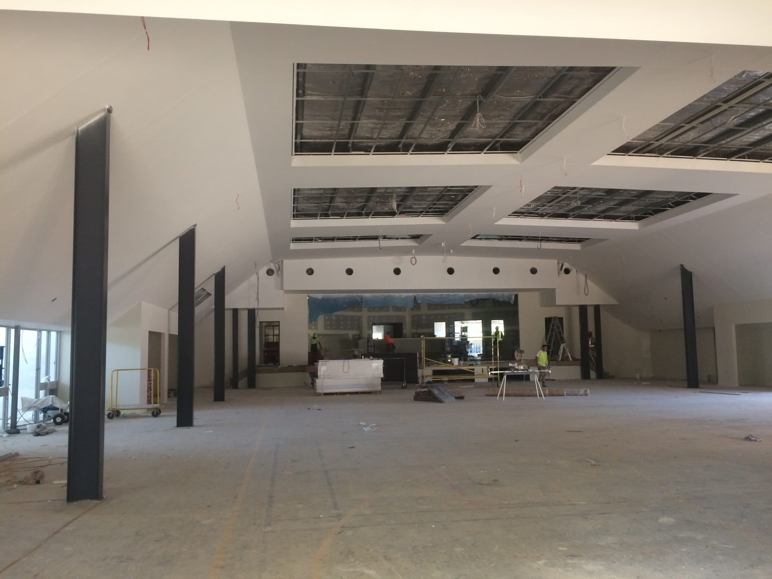 Large commercial fitout under construction, steel framing and ceiling grid exposed, Central West NSW