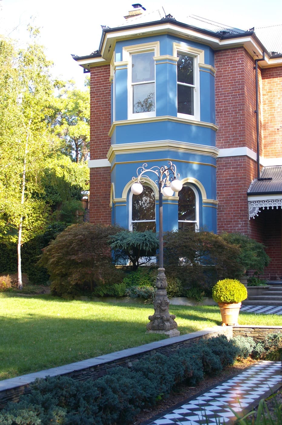 Heritage blue bay window facade