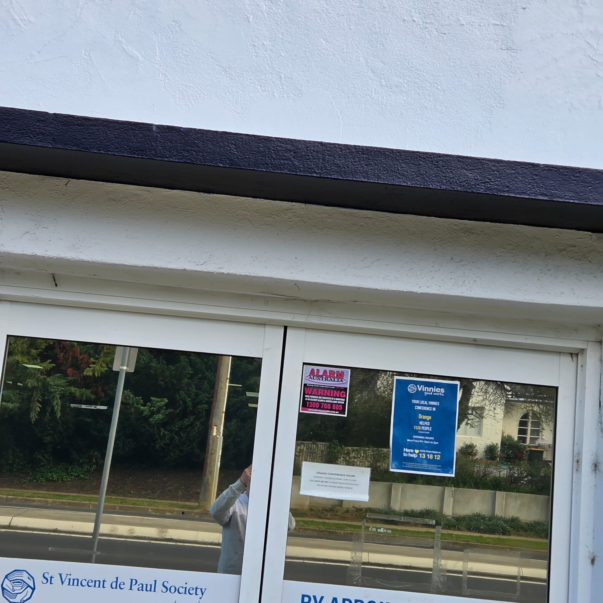Repainted fascia above a shopfront window on a commercial building in Orange NSW