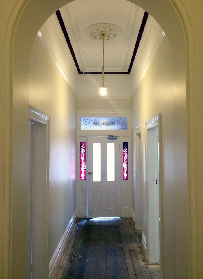 Hallway arch ceiling with stained glass
