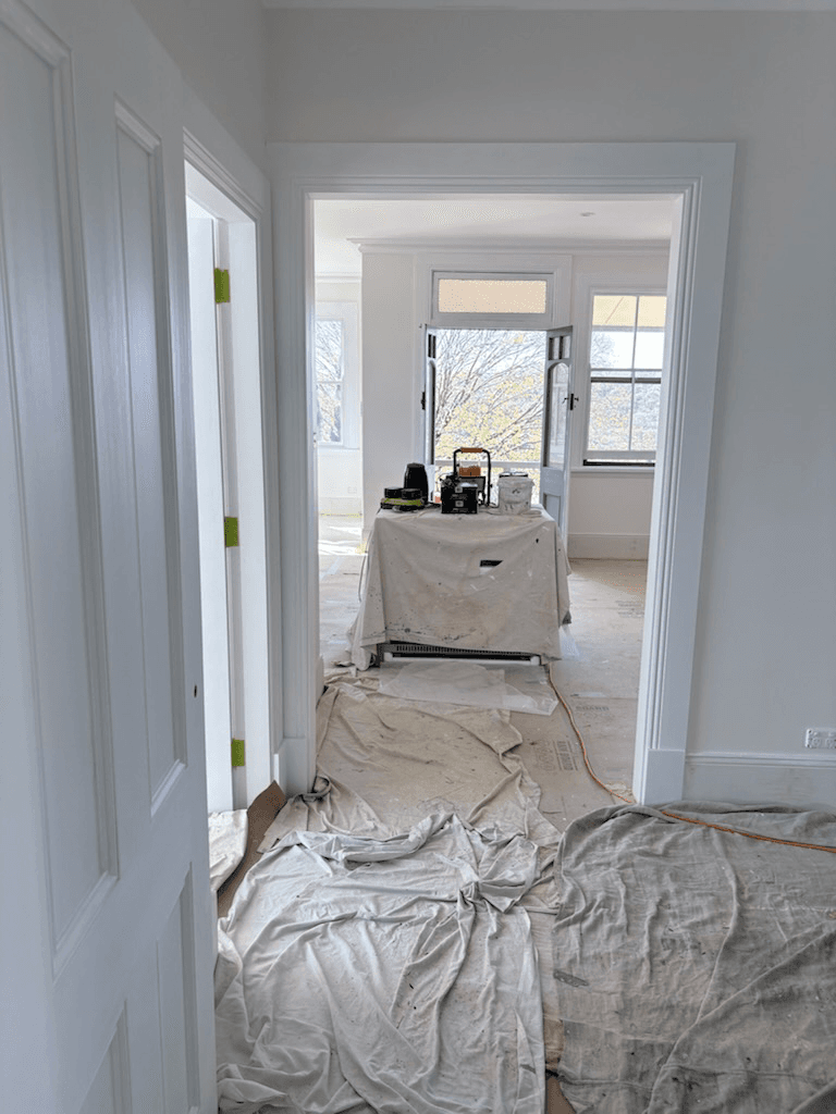 Hallway prepared with drop sheets