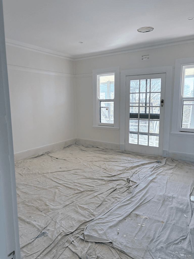 Room with French doors prepared for painting
